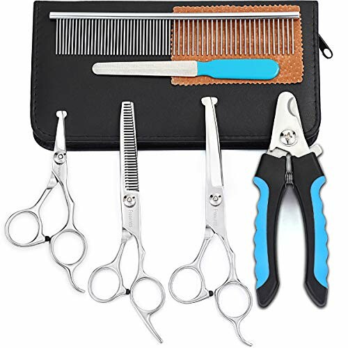 Pet grooming kit with scissors, comb, and nail clippers